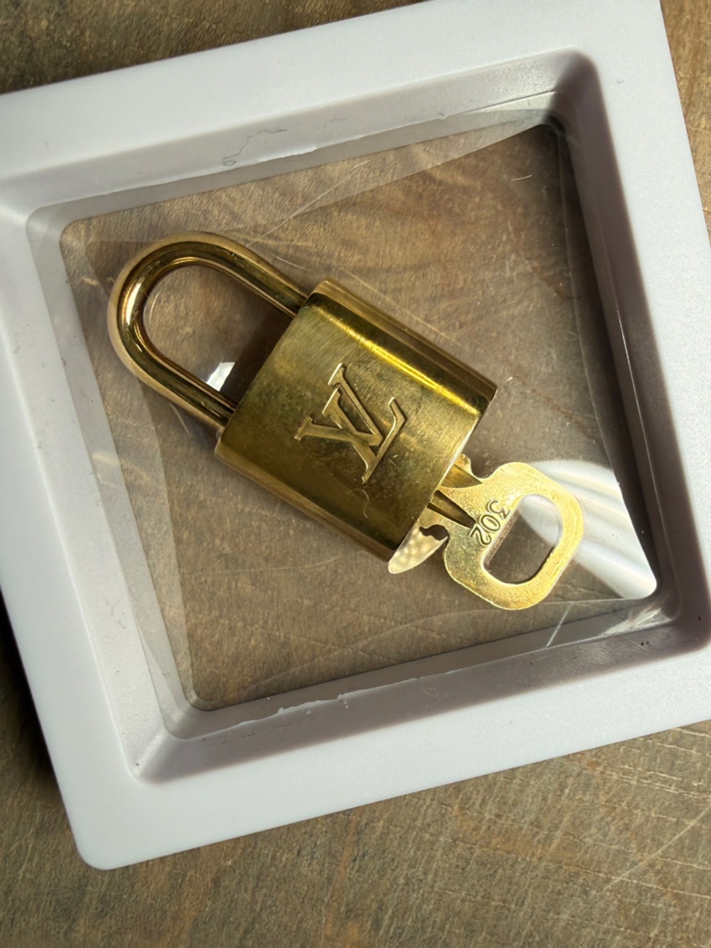 LouisVuitton key lock gold
